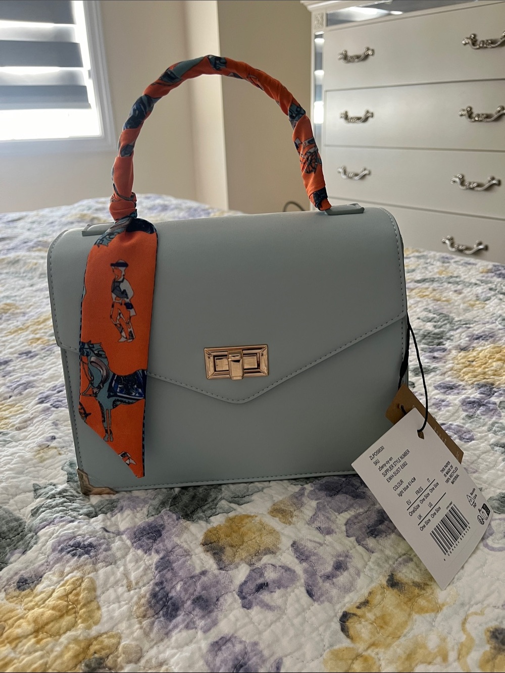 Chic Light Blue Top-Handle Satchel with Orange Scarf Accent